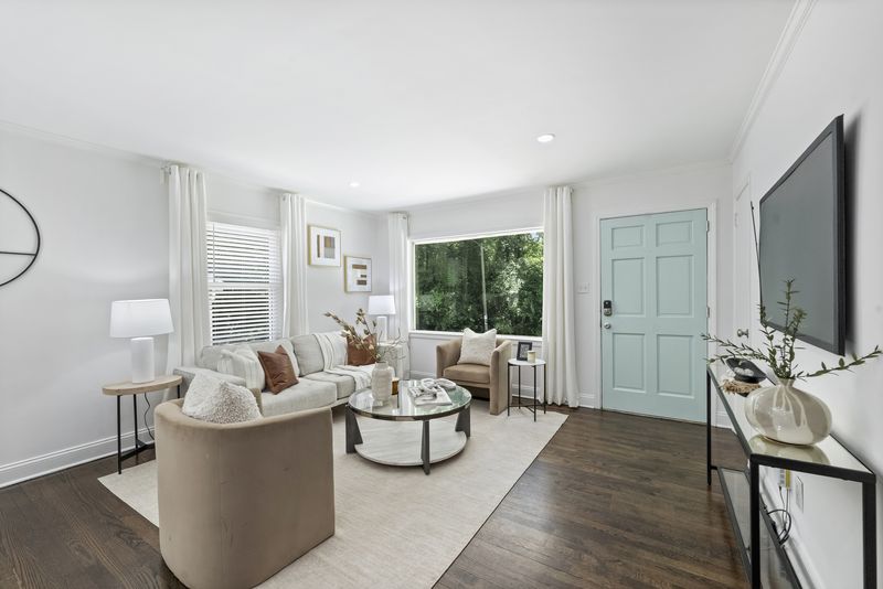 Front living room with a wide picture window